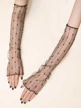 paire de gants en dentelle fluide à pois et fil doré
