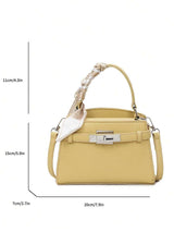 Sac à main de femme décoré d'un foulard en soie haut de gamme et élégant